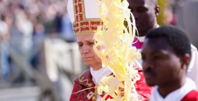 Pope Leo XIV rejects claims that God justifies war in Palm Sunday Mass message : NPR