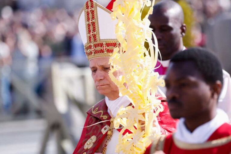 Pope Leo XIV rejects claims that God justifies war in Palm Sunday Mass message : NPR
